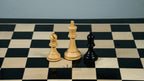 3.75” THE FISCHER SPASSKY 1972 SERIES EBONISED DOUBLE WEIGHTED CHESS PIECES, 21” EBONY BOARD & BOX