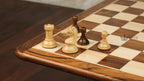 3.75” REPRODUCTION OF DRUEKE PLAYER CHOICE GOLDEN ROSEWOOD CHESS PIECES, 21” GOLDEN ROSEWOOD BOARD AND CHESS BOX