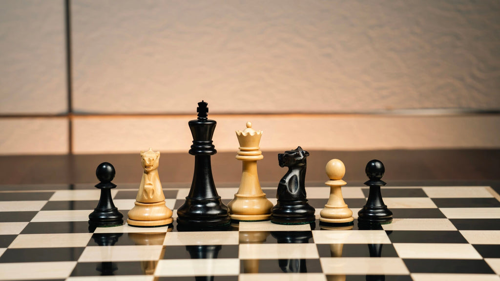 3.75” THE FISCHER SPASSKY 1972 SERIES EBONISED DOUBLE WEIGHTED CHESS PIECES, 21” EBONY BOARD & BOX