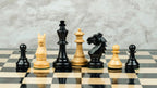 3.9” REPRODUCED BOHEMIAN EBONISED TRIPLE WEIGHTED CHESS PIECES, 21” EBONY CHESSBOARD & STORAGE BOX