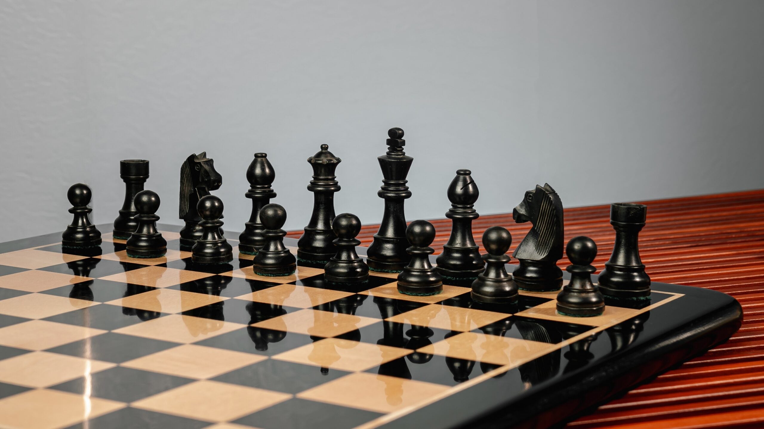 3.75” EBONISED GERMAN KNIGHT WEIGHTED CHESS PIECES WITH 21” EBONY CHESSBOARD
