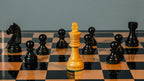 3.75” EBONISED GERMAN KNIGHT WEIGHTED CHESS PIECES WITH 21” EBONY CHESSBOARD