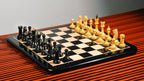 4.5” CIRCA 1960’s SOVIET RUSSIAN WEIGHTED EBONISED CHESS PIECES, 21” EBONY CHESSBOARD & BOX